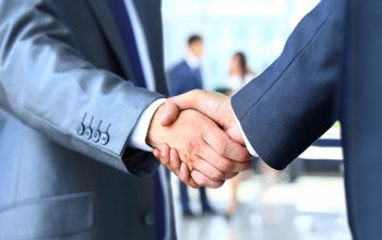 Two businessman shaking hands